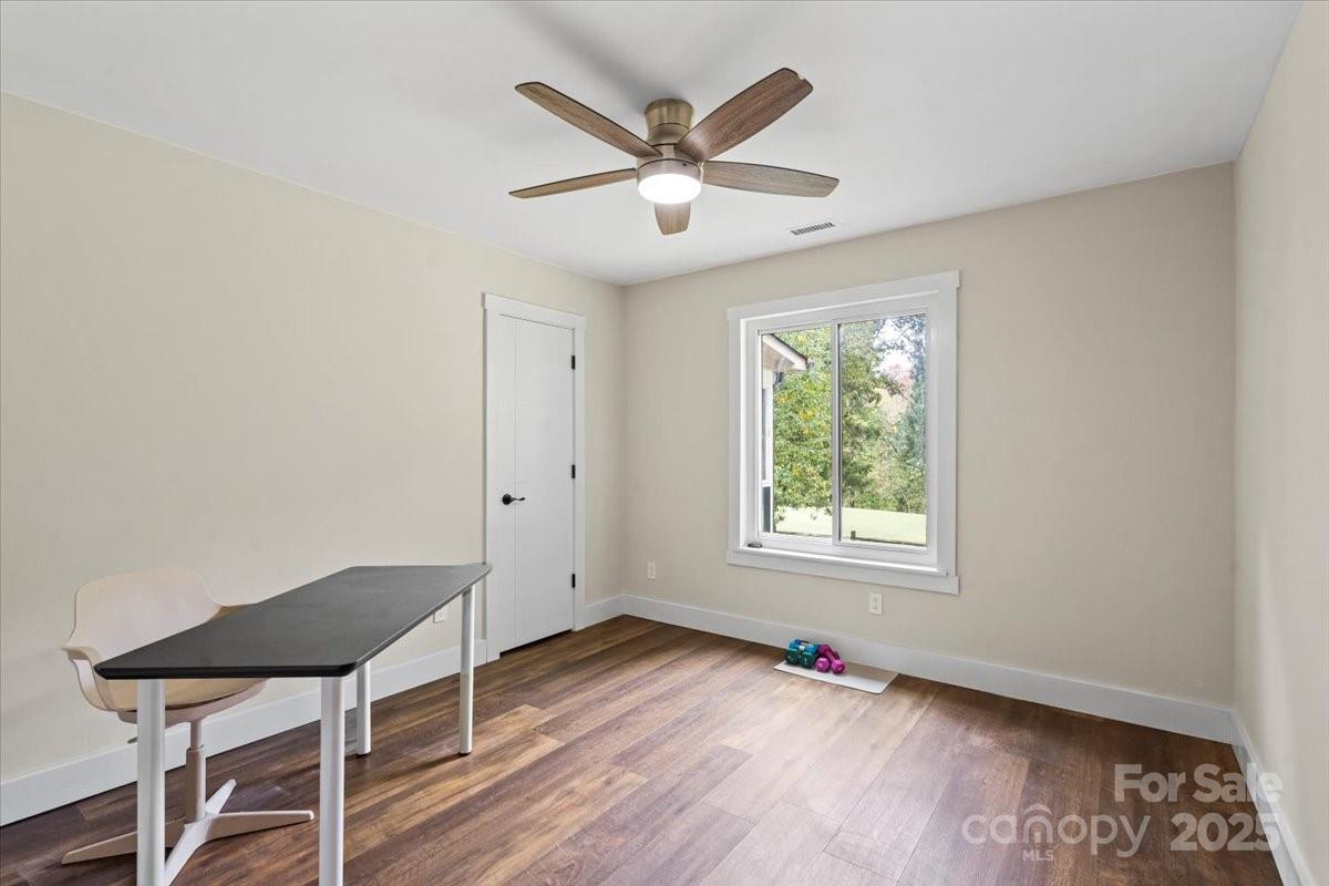 4308 Rounding Run Road Charlotte, NC 28277 - Photo 34 of 48 a house with wooden floor and windows