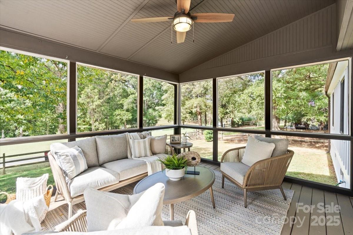 4308 Rounding Run Road Charlotte, NC 28277 - Photo 36 of 48 a living room with furniture and a large window