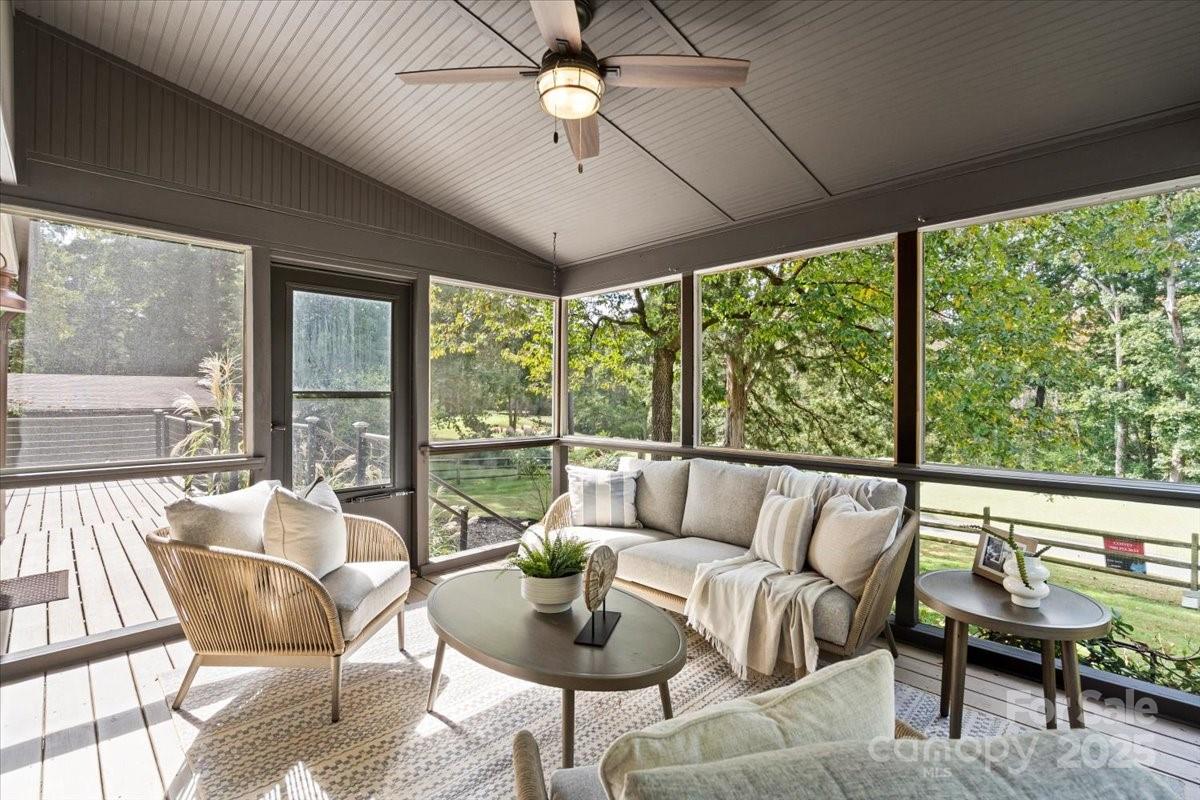 4308 Rounding Run Road Charlotte, NC 28277 - Photo 37 of 48 a living room with furniture and a large window