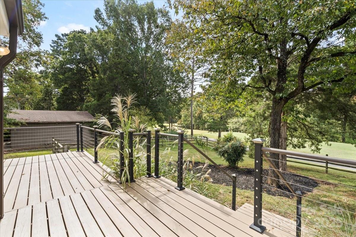 4308 Rounding Run Road Charlotte, NC 28277 - Photo 39 of 48 a balcony with wooden floor and outdoor seating