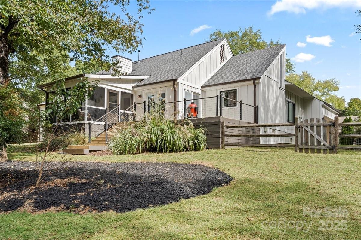 4308 Rounding Run Road Charlotte, NC 28277 - Photo 42 of 48 a backyard of a house with yard and outdoor seating