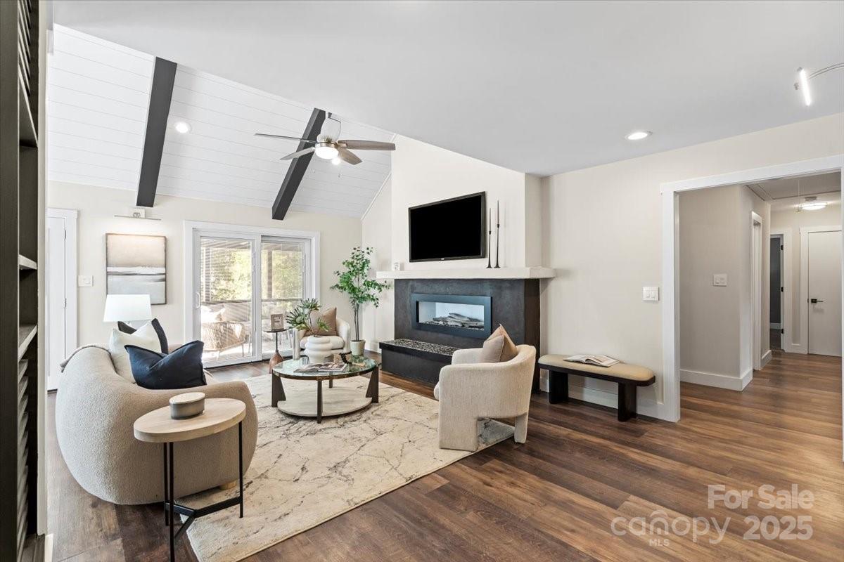 4308 Rounding Run Road Charlotte, NC 28277 - Photo 5 of 48 a living room with fireplace furniture and a flat screen tv