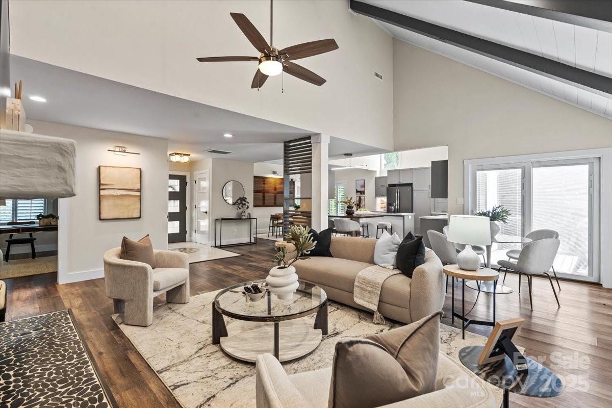 4308 Rounding Run Road Charlotte, NC 28277 - Photo 7 of 48 a living room with furniture and a large window