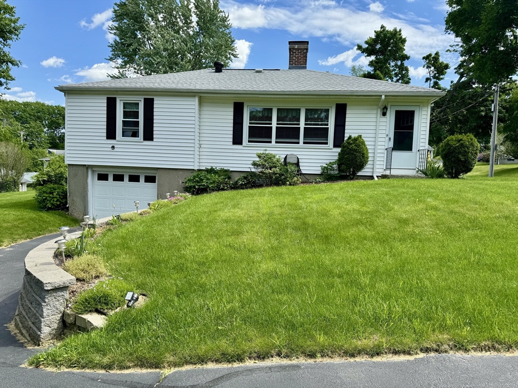 133 Bay State Road Worcester, MA 01606 - Photo 1 of 36 a front view of a house with garden