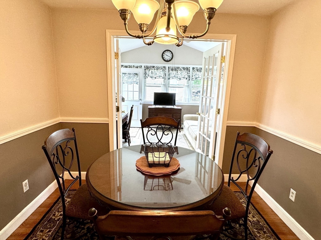 133 Bay State Road Worcester, MA 01606 - Photo 11 of 36 a view of a dining room with furniture and window