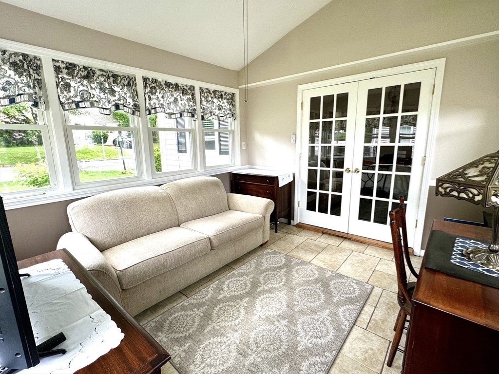 133 Bay State Road Worcester, MA 01606 - Photo 14 of 36 a living room with furniture and a large window