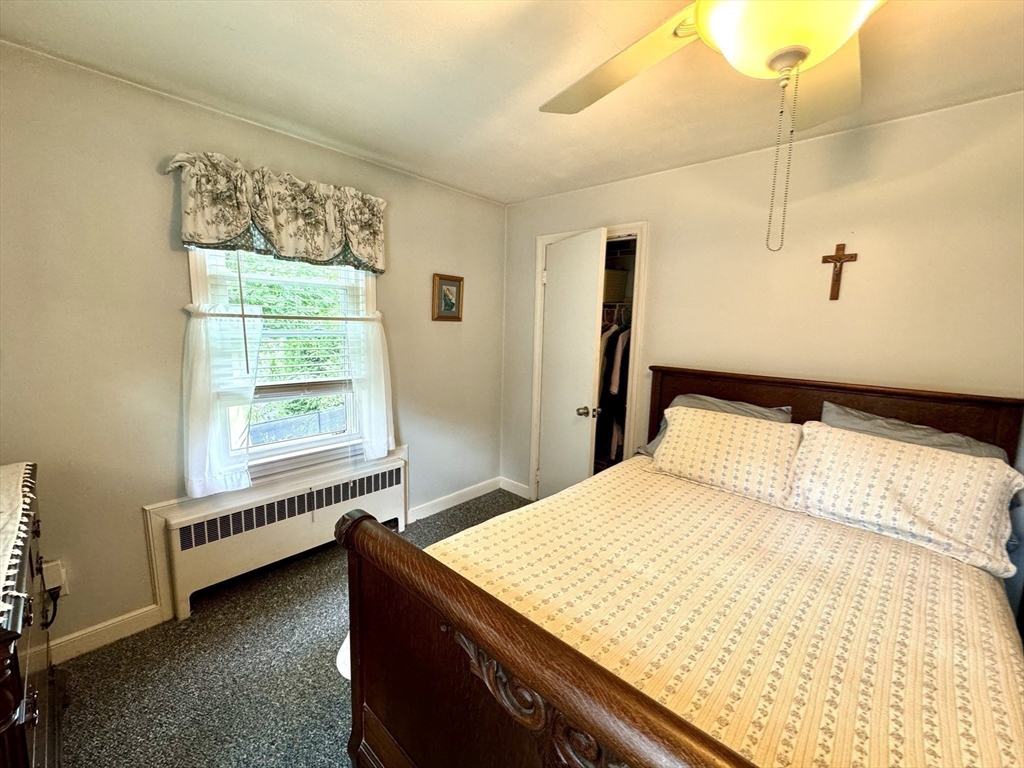 133 Bay State Road Worcester, MA 01606 - Photo 24 of 36 a bedroom with a bed and a window