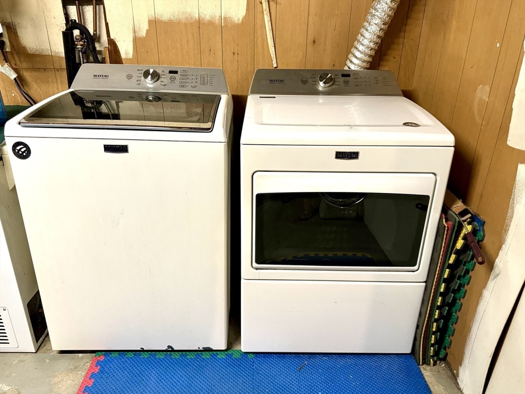 133 Bay State Road Worcester, MA 01606 - Photo 31 of 36 a view of washer and dryer with wooden floor