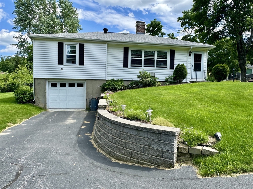 133 Bay State Road Worcester, MA 01606 - Photo 36 of 36 a view of a house with a yard and potted plants