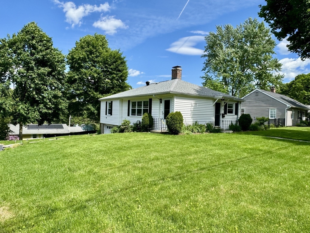 133 Bay State Road Worcester, MA 01606 - Photo 6 of 36 a front view of house with yard and green space