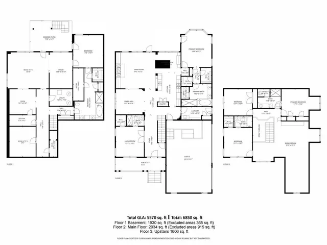 an empty room with windows fireplace and wooden floor