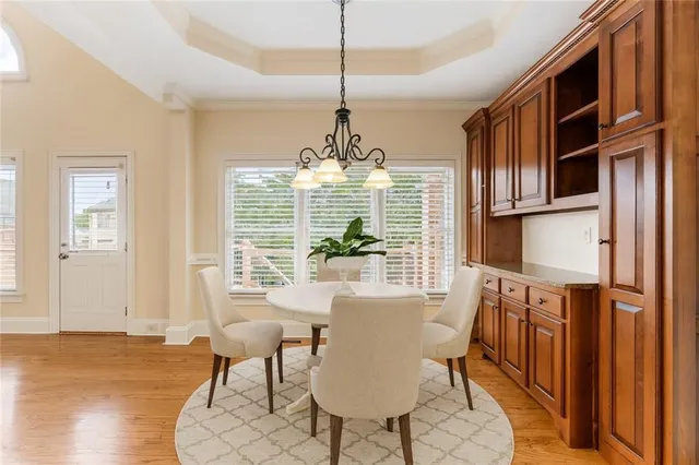 a bathroom with a sink vanity mirror and toilet