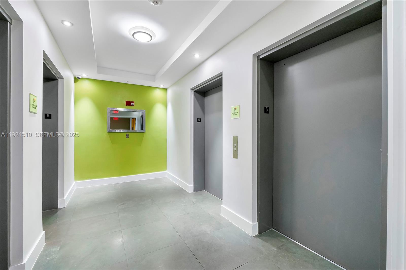 133 Northeast 2nd Avenue, Unit 508 Miami, FL 33132 - Photo 3 of 17 a view of an empty room with window