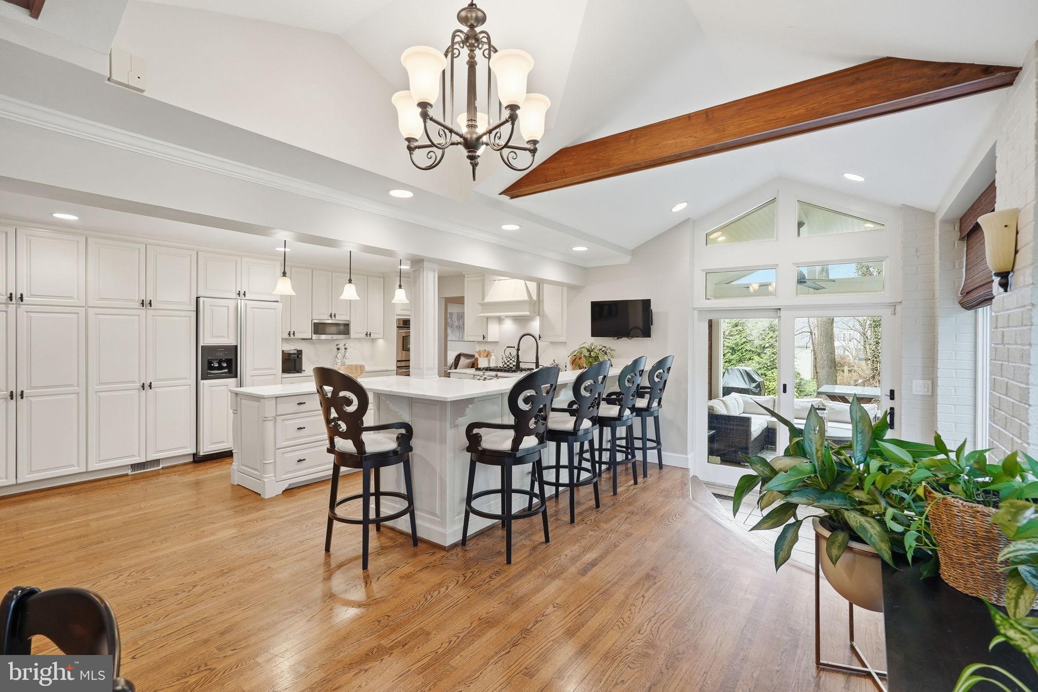 1 Paddock Court Potomac, MD 20854 - Photo 7 of 34 Expanded & Renovated Kitchen w/ Breakfast Bar