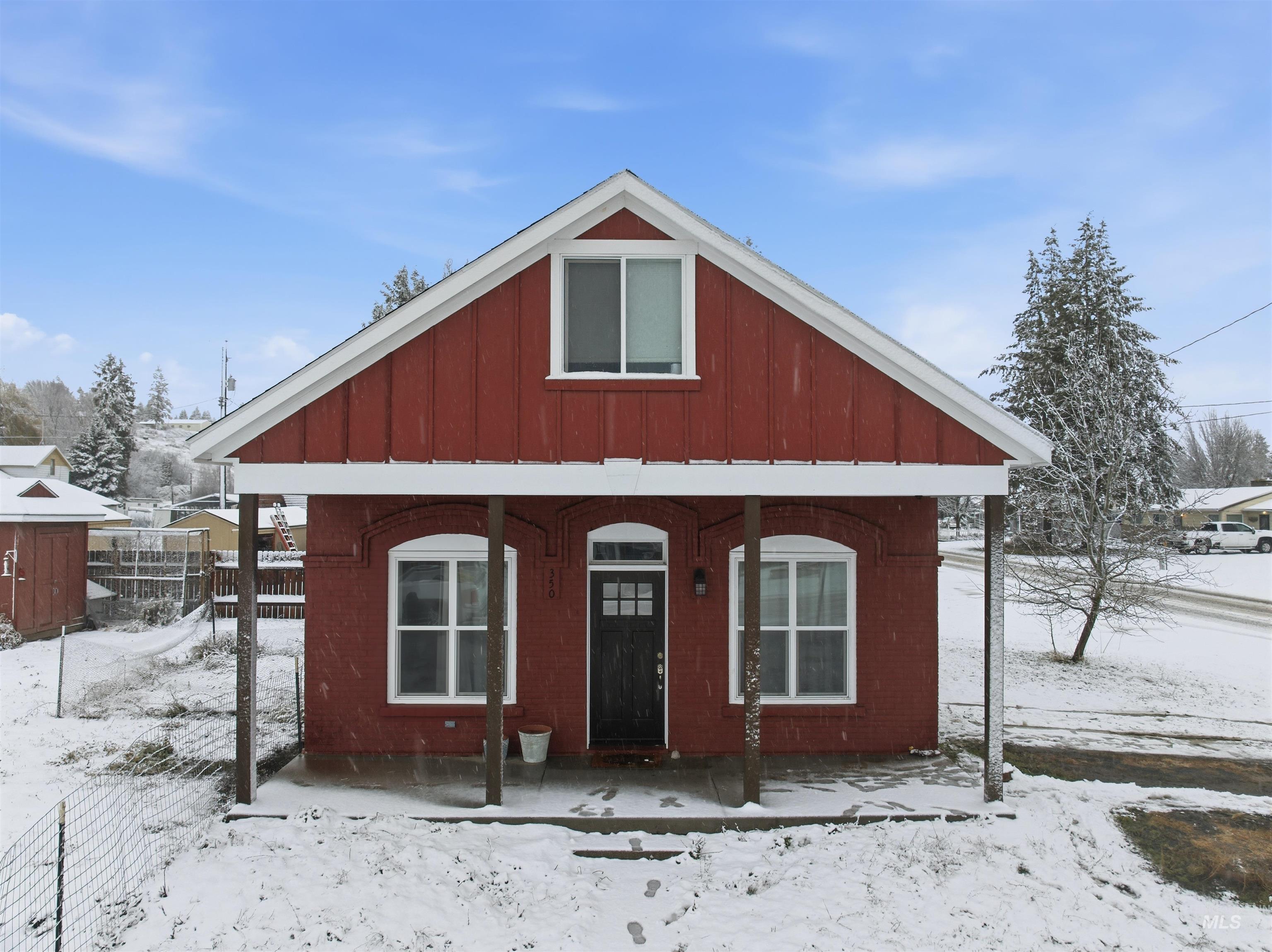 350 East Walnut Avenue Genesee, ID 83832 - Photo 26 of 27 View of front facade with a porch and board and batten siding