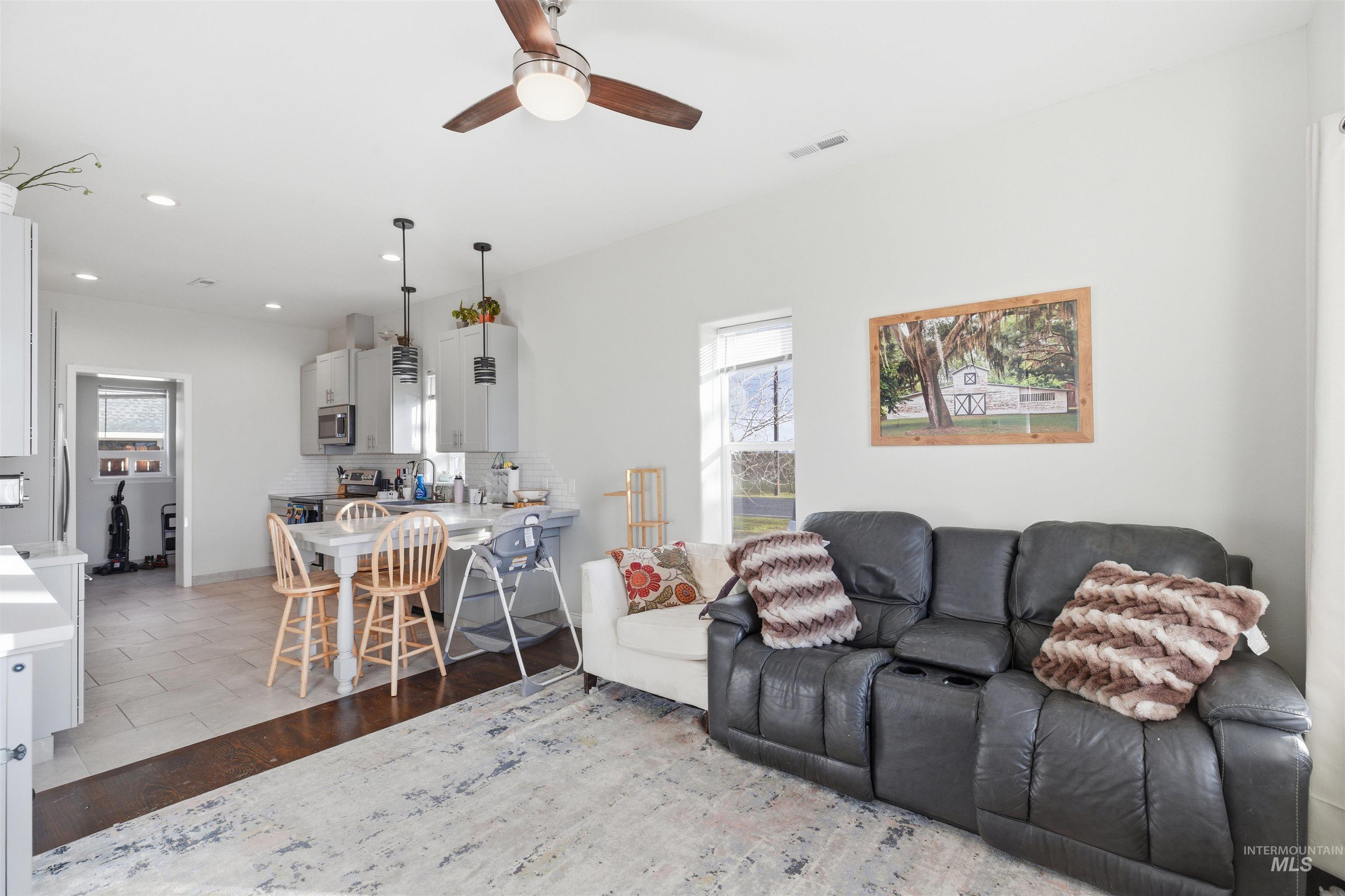 350 East Walnut Avenue Genesee, ID 83832 - Photo 3 of 27 Living room featuring recessed lighting, a ceiling fan, and light wood-type flooring