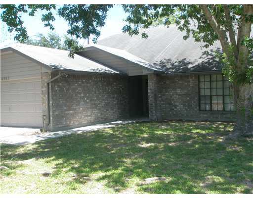 6902 Fawn Ridge Drive Corpus Christi, TX 78413 - Photo 1 of 1 a backyard of a house with lots of green space
