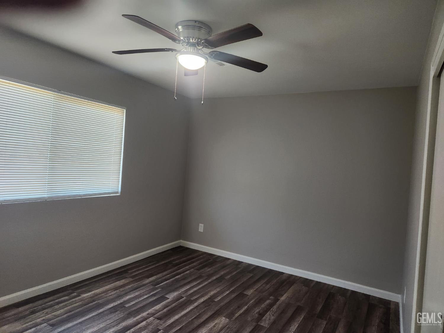 Undisclosed Address Bakersfield, CA 93309 - Photo 15 of 22 an empty room with a window