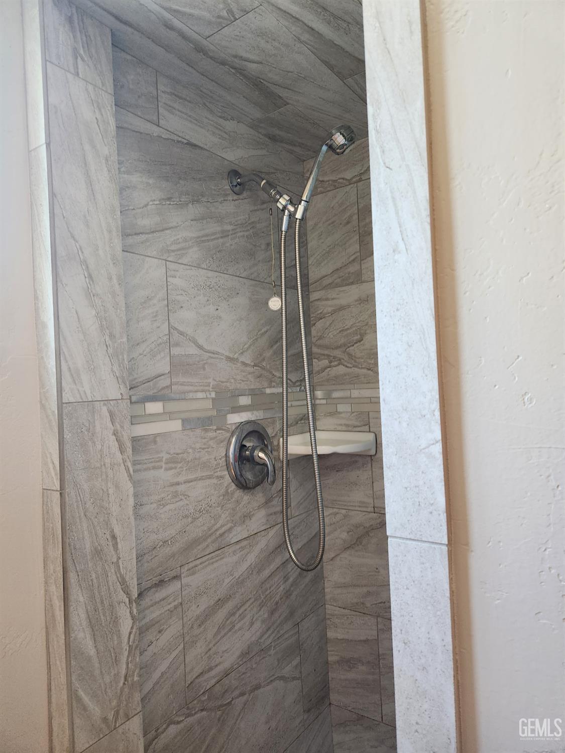 Undisclosed Address Bakersfield, CA 93309 - Photo 18 of 22 a bathroom with a shower