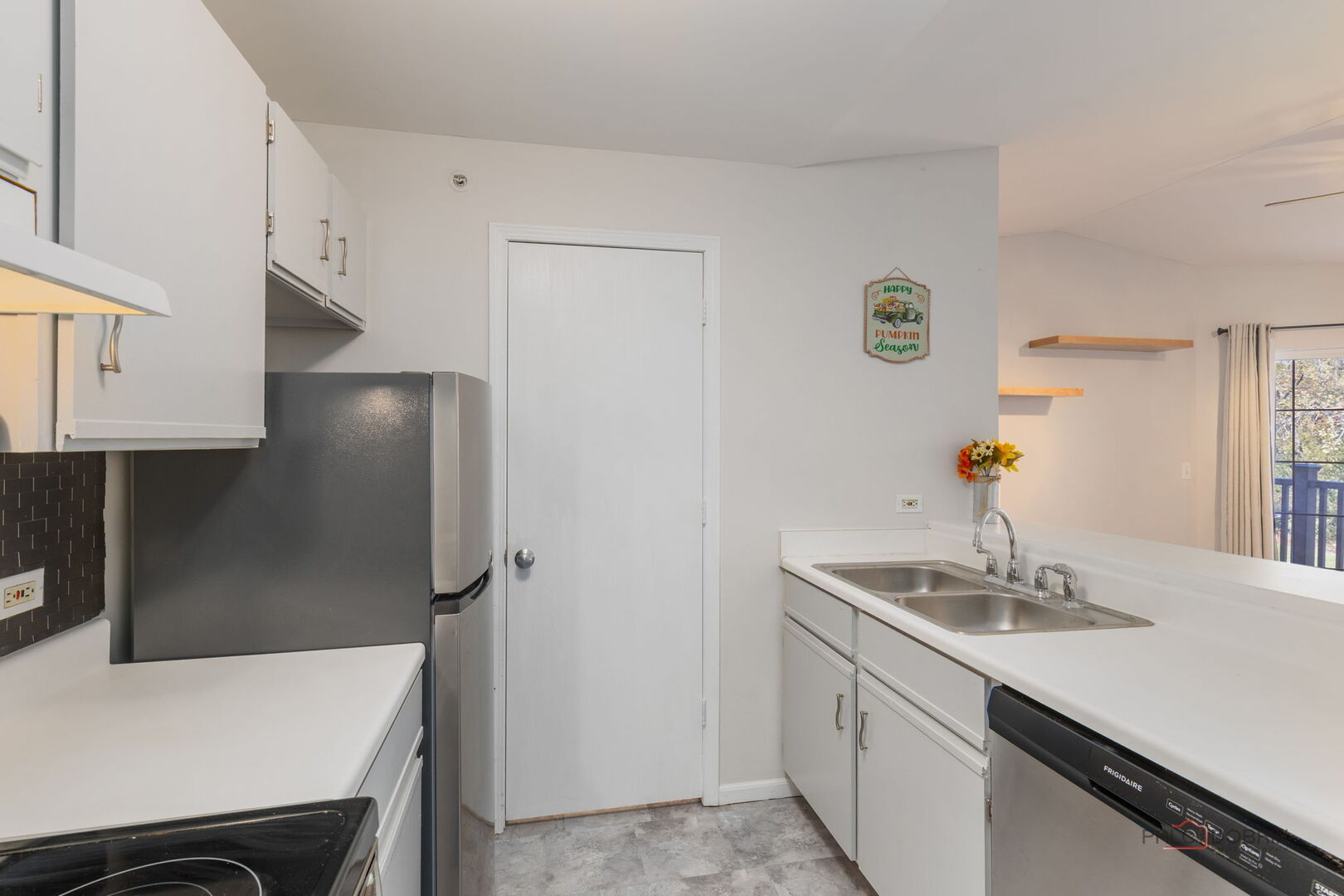1506 Spring Brook Court, Unit 2C Round Lake Beach, IL 60073 - Photo 8 of 16 a bathroom with a sink and a mirror