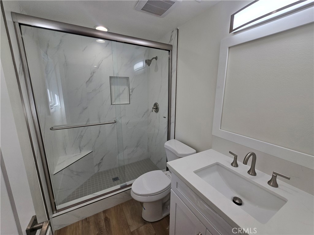 34516 Via Verde Dana Point, CA 92624 - Photo 11 of 22 a bathroom with a sink mirror toilet and shower