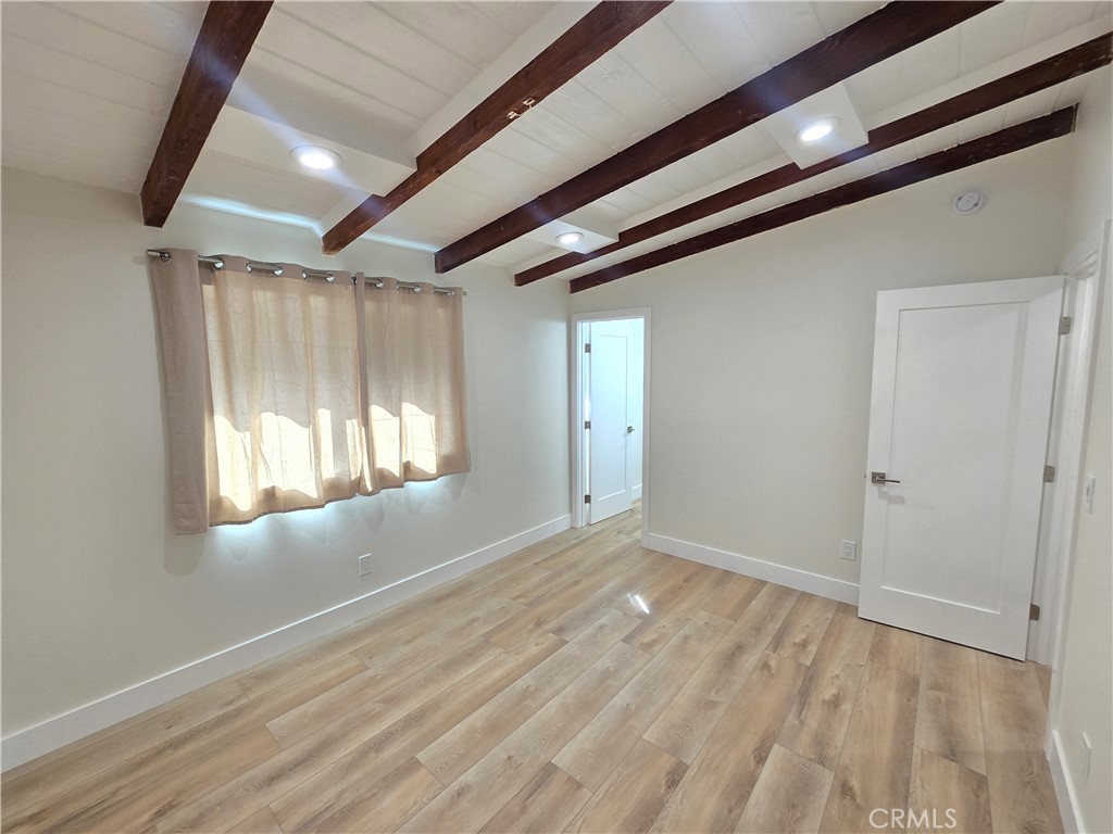 34516 Via Verde Dana Point, CA 92624 - Photo 19 of 22 a view of empty room with wooden floor and fan