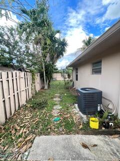 6123 Southwest 4th Place Margate, FL 33068 - Photo 11 of 12 a view of a backyard with sitting area