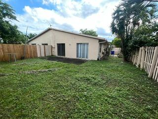 6123 Southwest 4th Place Margate, FL 33068 - Photo 12 of 12 a view of a backyard of house