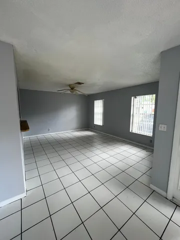 a view of an empty room and window