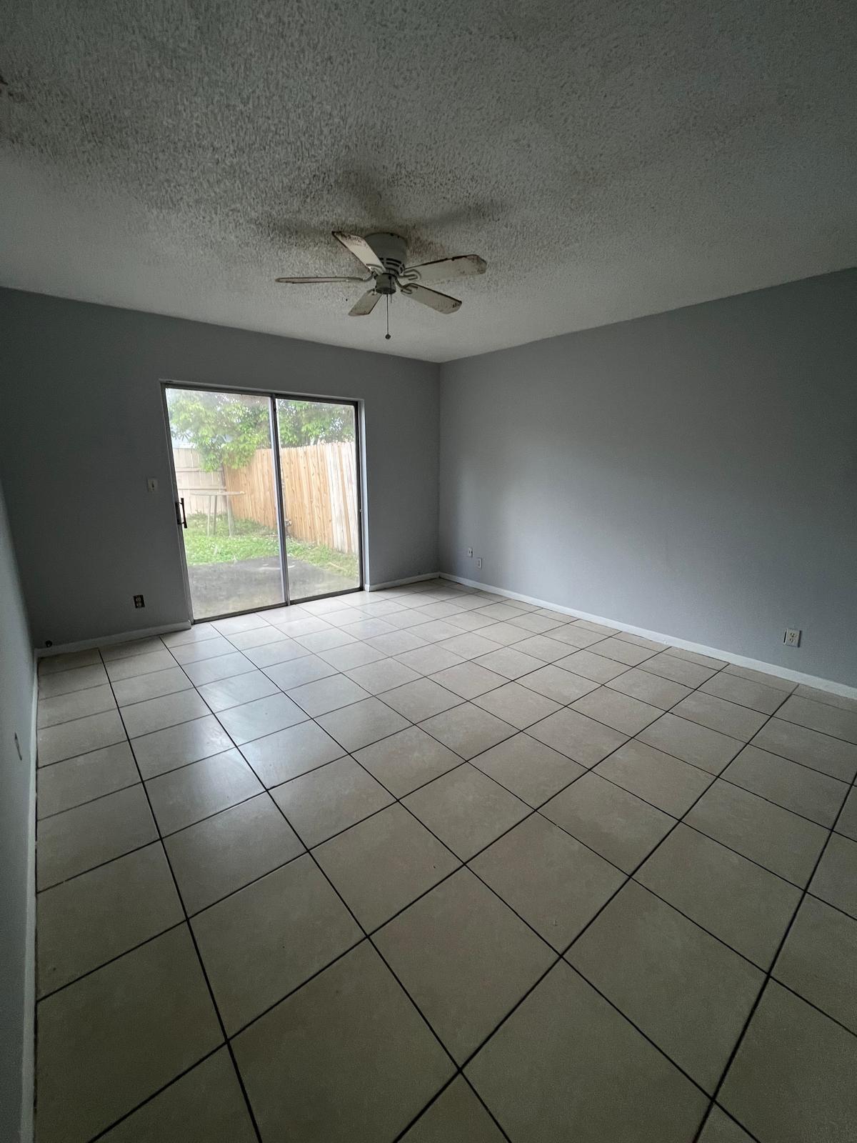 6123 Southwest 4th Place Margate, FL 33068 - Photo 7 of 12 a view of a livingroom with window