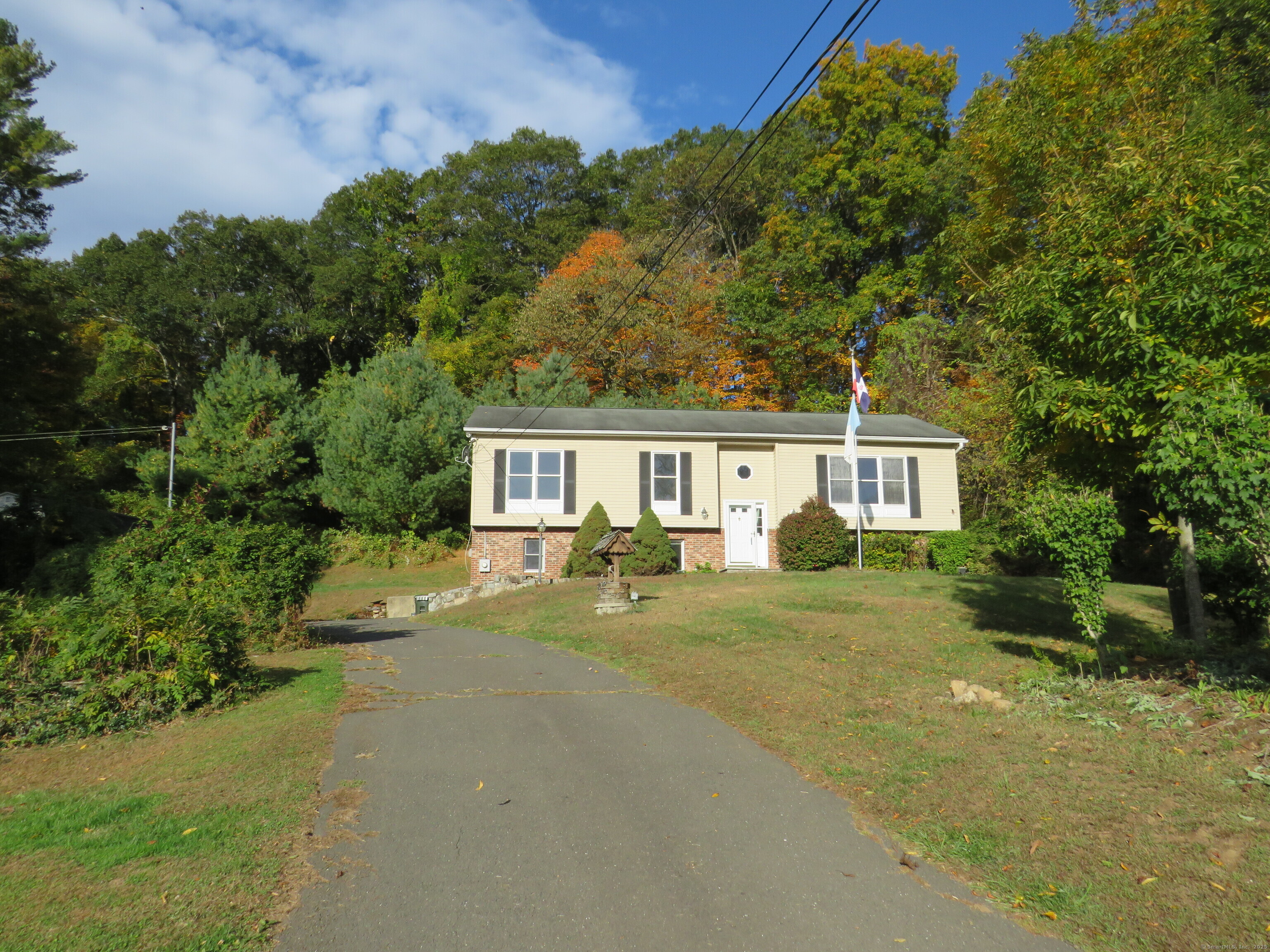 15 Hayestown Heights Danbury, CT 06811 - Photo 1 of 28 a front view of a house with a yard
