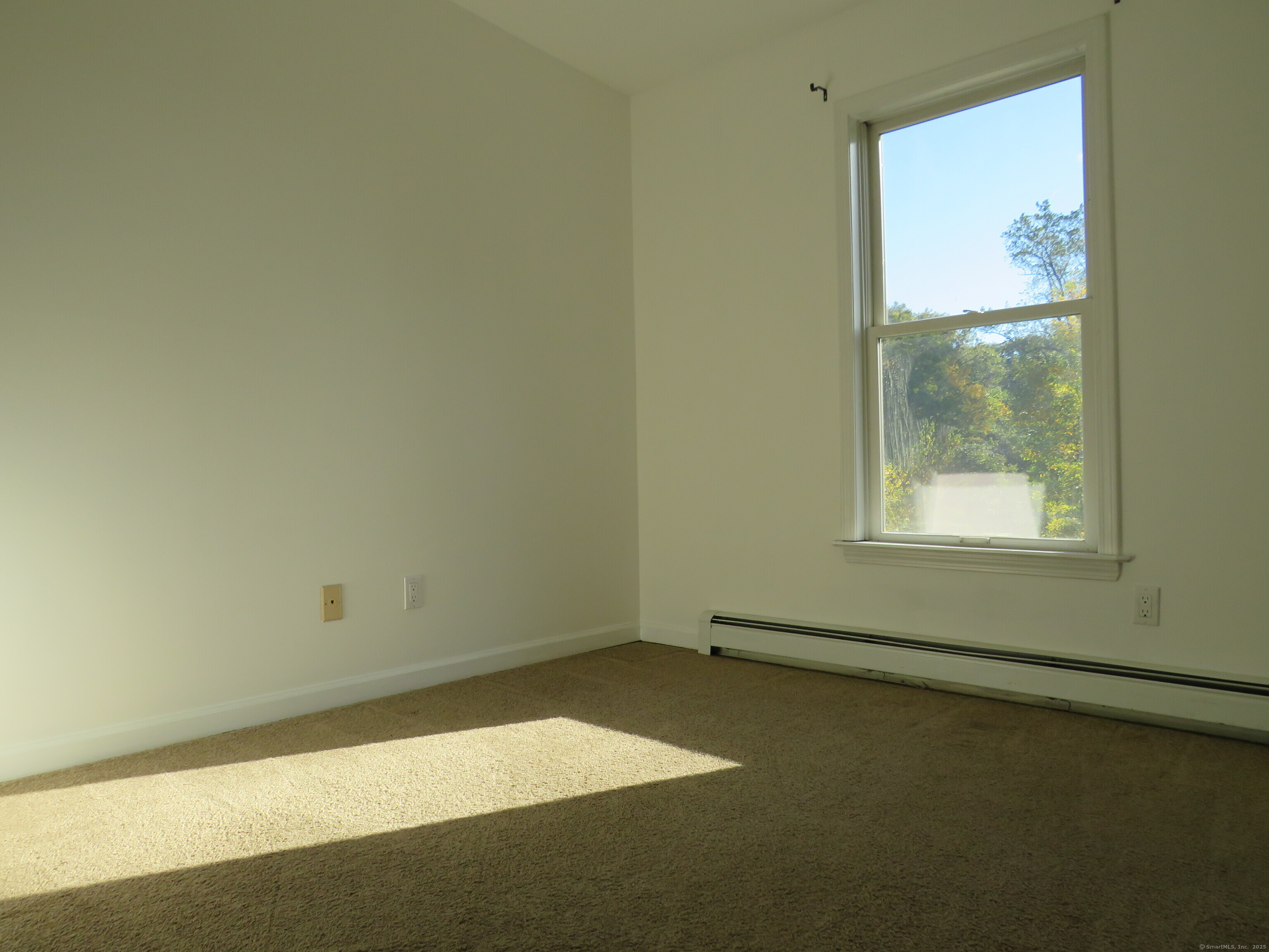 15 Hayestown Heights Danbury, CT 06811 - Photo 11 of 28 an empty room with a window