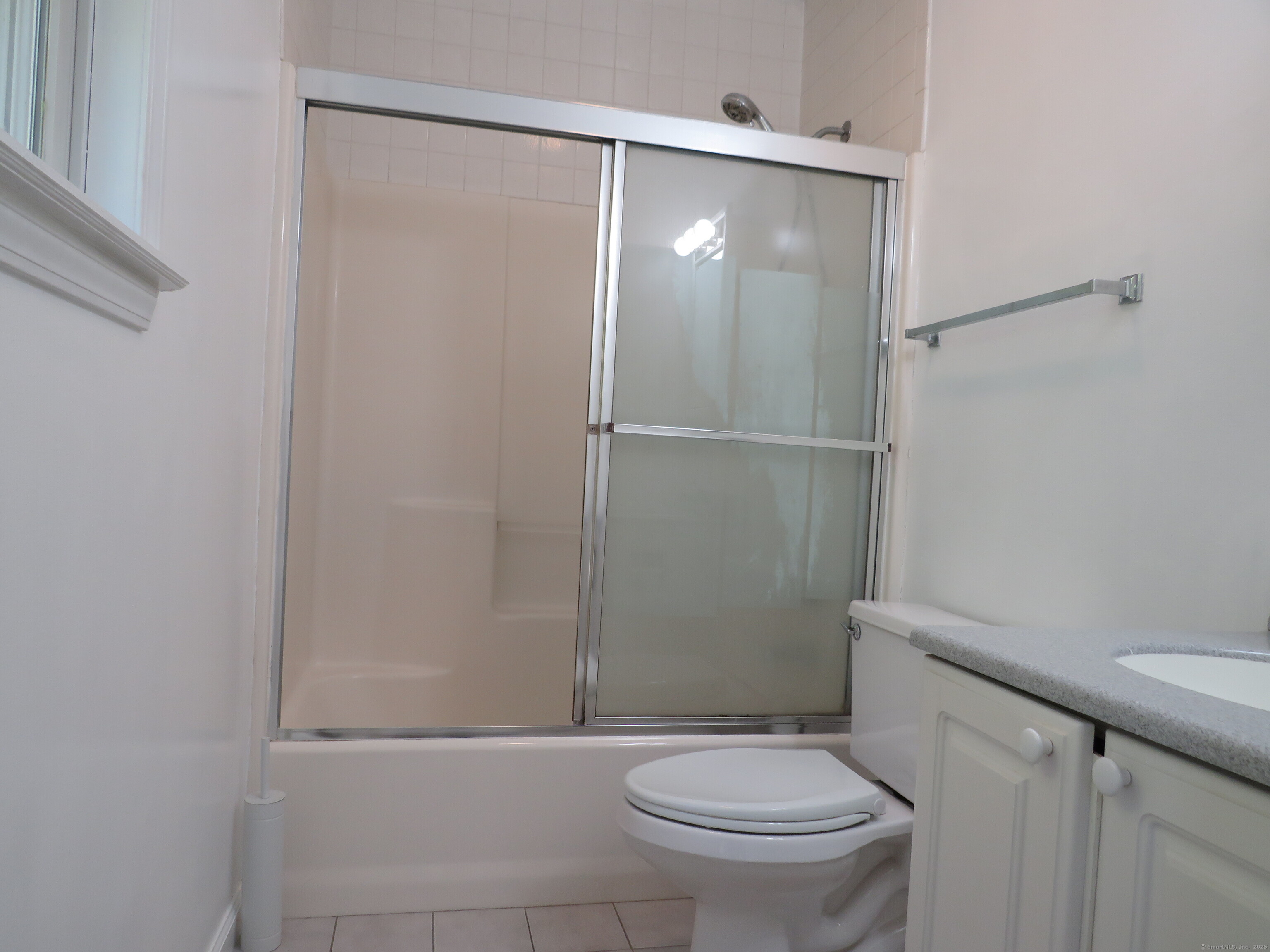 15 Hayestown Heights Danbury, CT 06811 - Photo 16 of 28 a bathroom with a granite countertop toilet and a sink