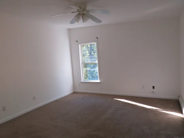 a bathroom with a sink and vanity