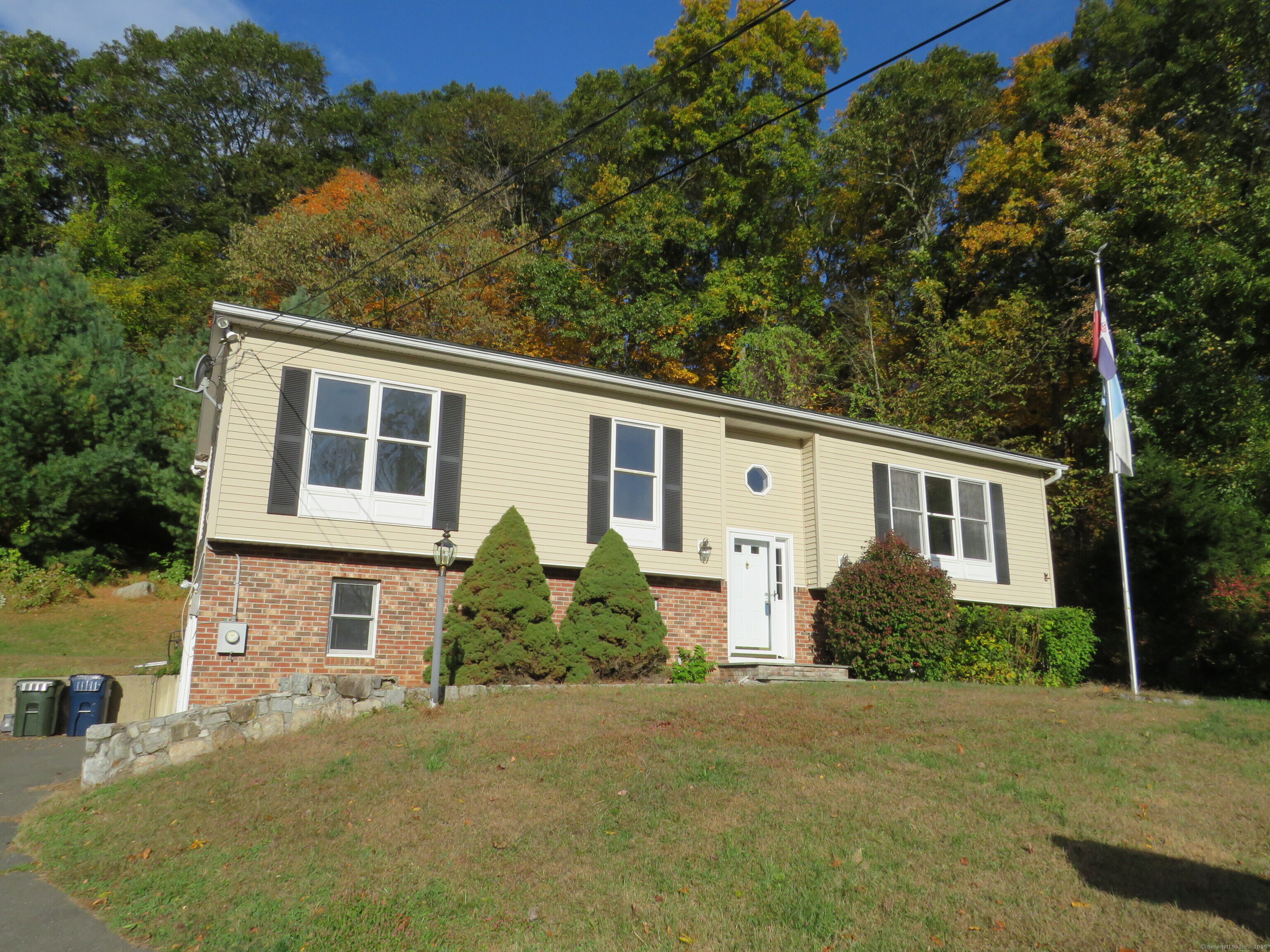 15 Hayestown Heights Danbury, CT 06811 - Photo 2 of 28 front view of a house with a yard