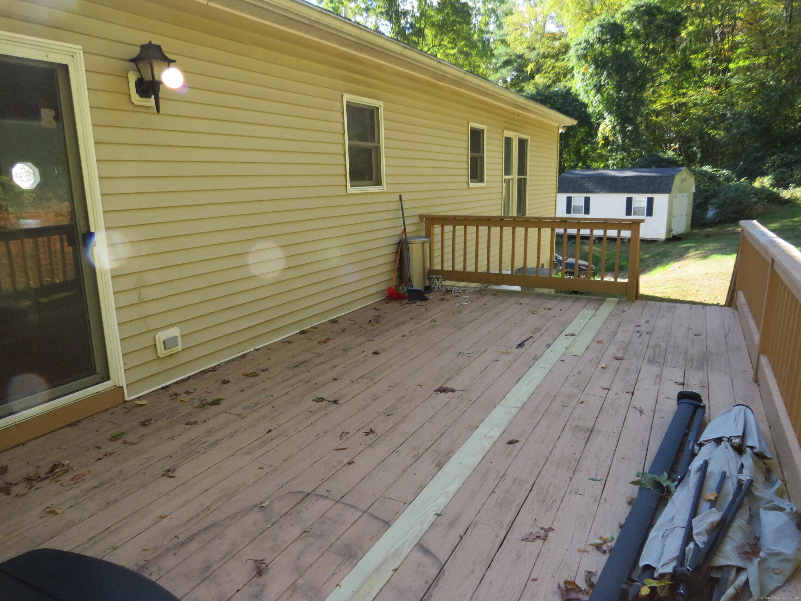 15 Hayestown Heights Danbury, CT 06811 - Photo 28 of 28 a view of a house with a wooden deck
