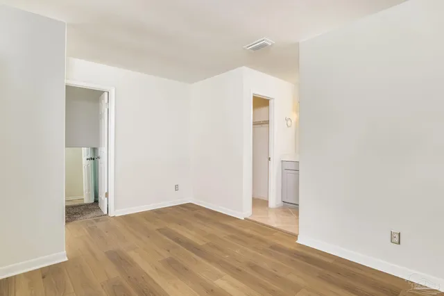 a view of a storage & utility room with washer and dryer