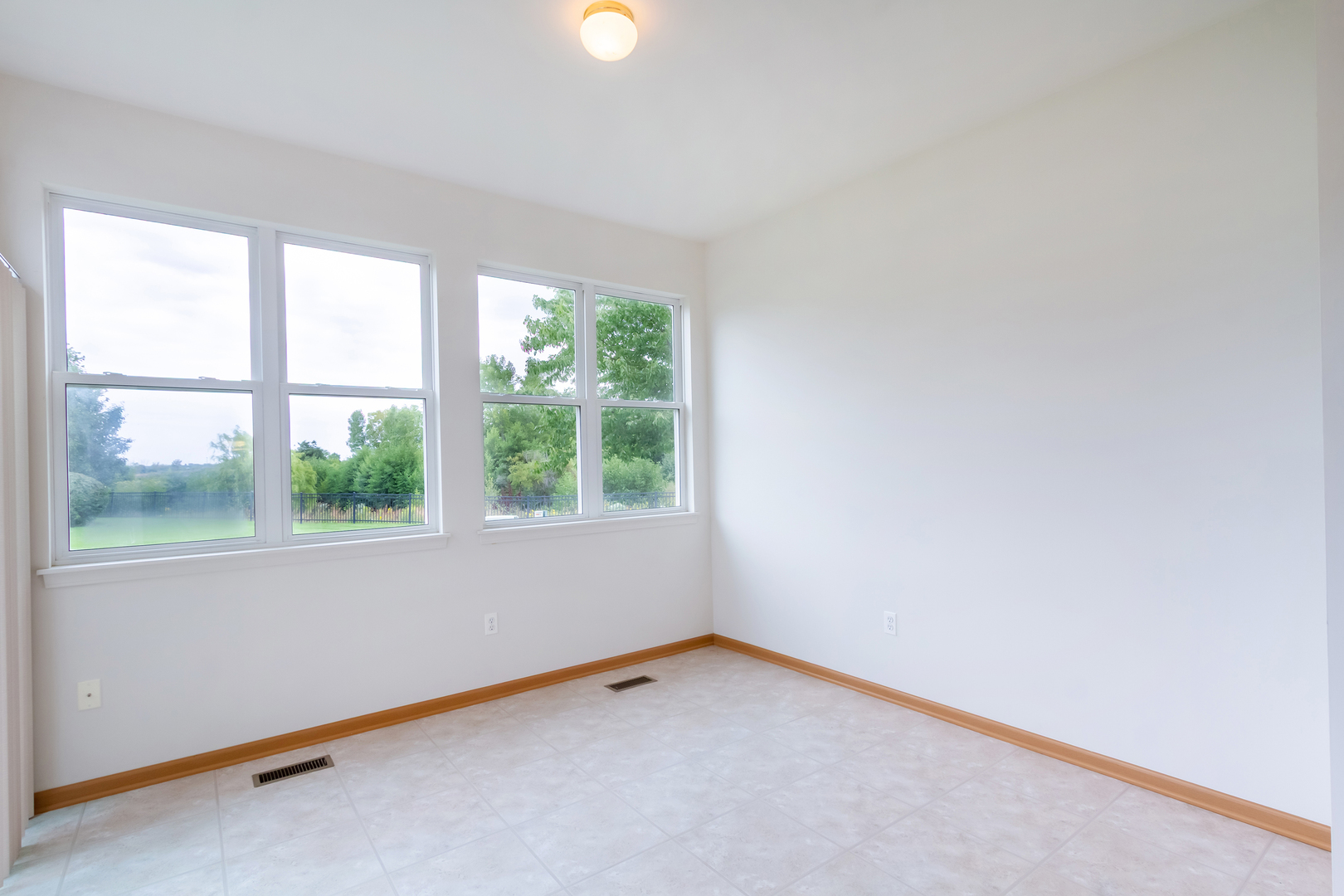 1508 Ludington Circle Romeoville, IL 60446 - Photo 15 of 28 an empty room with a window