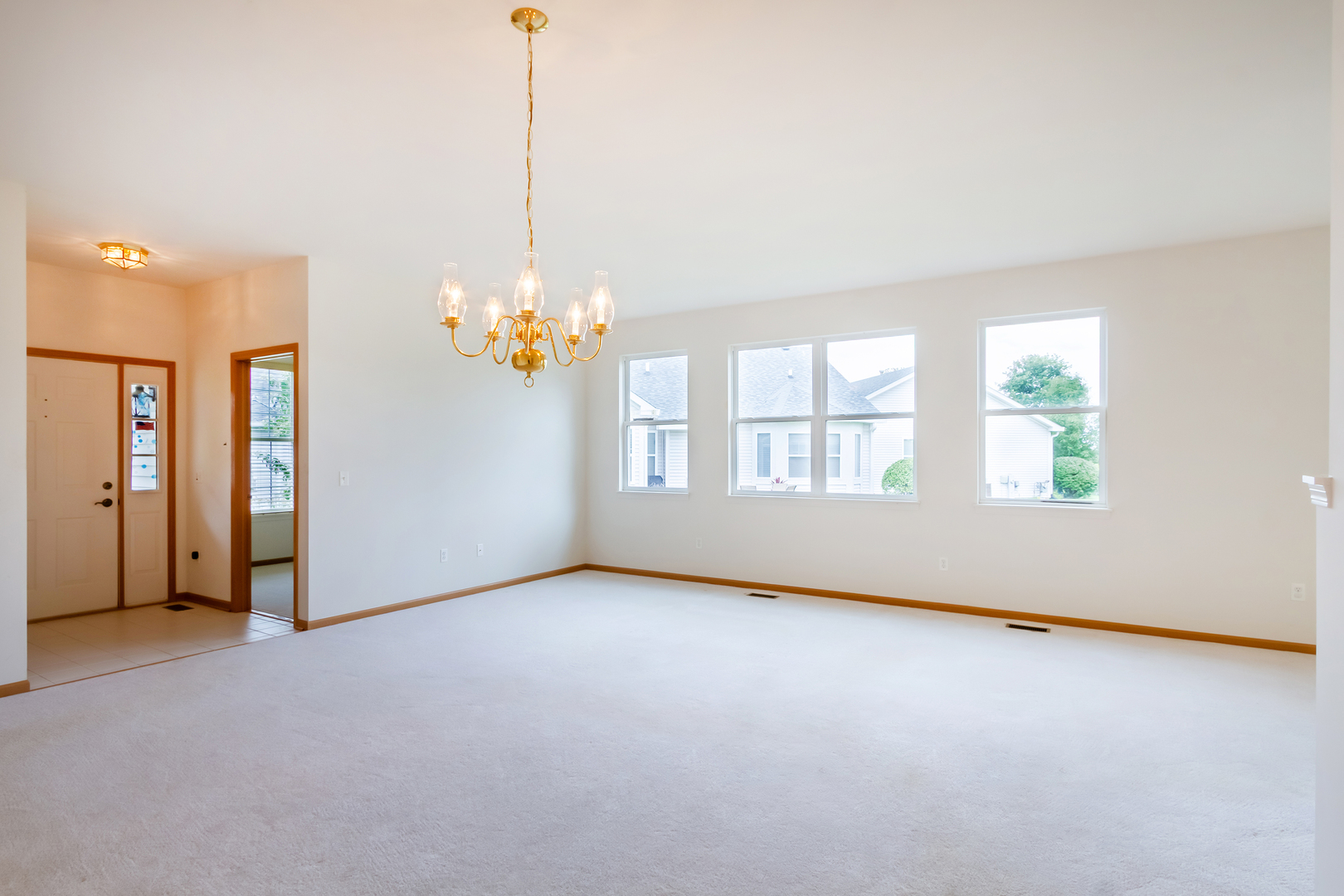 1508 Ludington Circle Romeoville, IL 60446 - Photo 5 of 28 a view of an empty room with a window