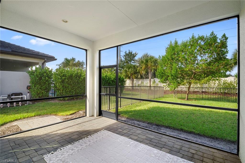 14720 Kingfisher Loop Naples, FL 34120 - Photo 15 of 50 View of unfurnished sunroom