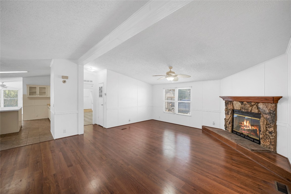 Living space leading to Kitchen and Master Bathroom