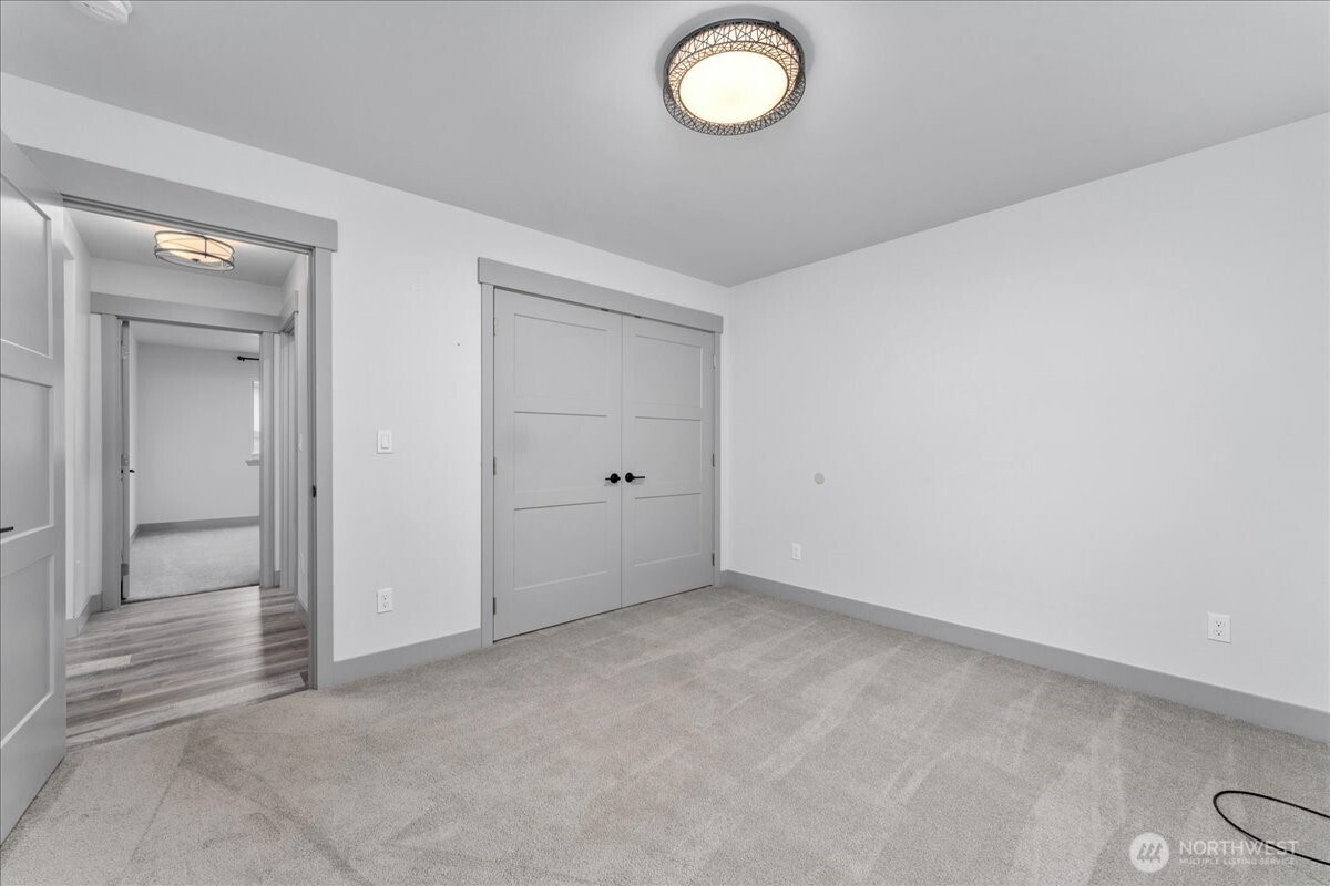 9978 Saska Way Entiat, WA 98822 - Photo 12 of 35 an empty room with windows