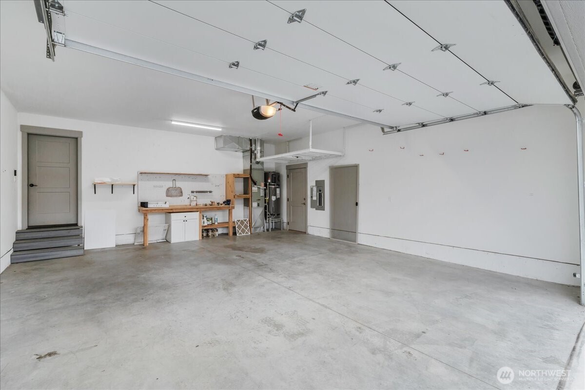 9978 Saska Way Entiat, WA 98822 - Photo 23 of 35 a view of a livingroom with furniture and a ceiling fan