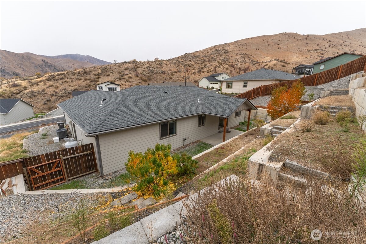 9978 Saska Way Entiat, WA 98822 - Photo 27 of 35 an aerial view of residential houses with outdoor space