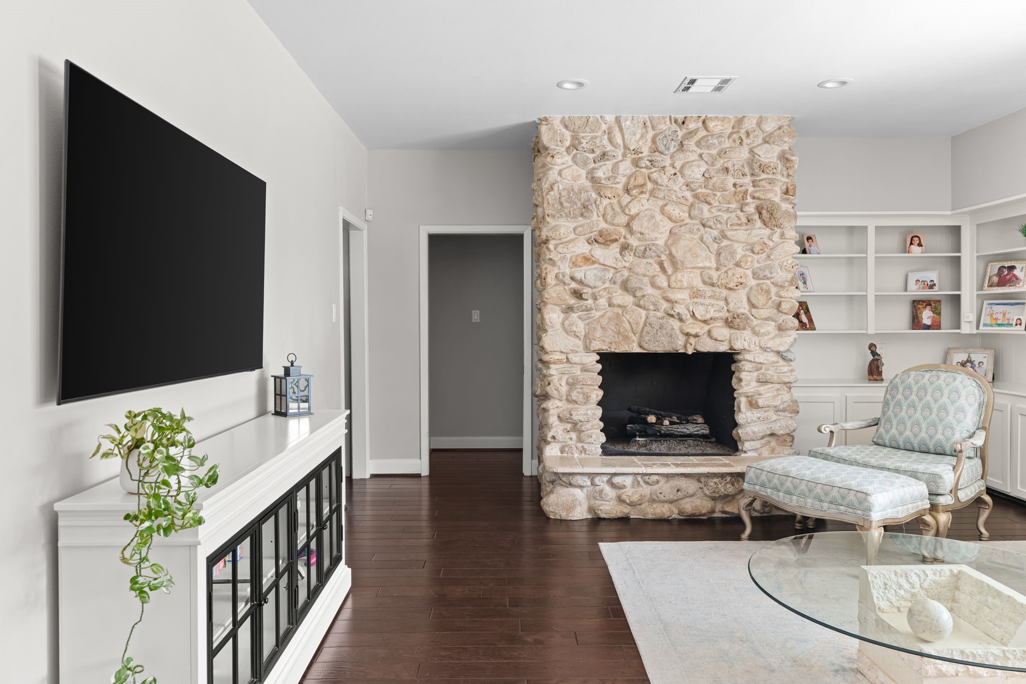 5743 Jason Street Houston, TX 77096 - Photo 11 of 26 a living room with furniture and a fireplace