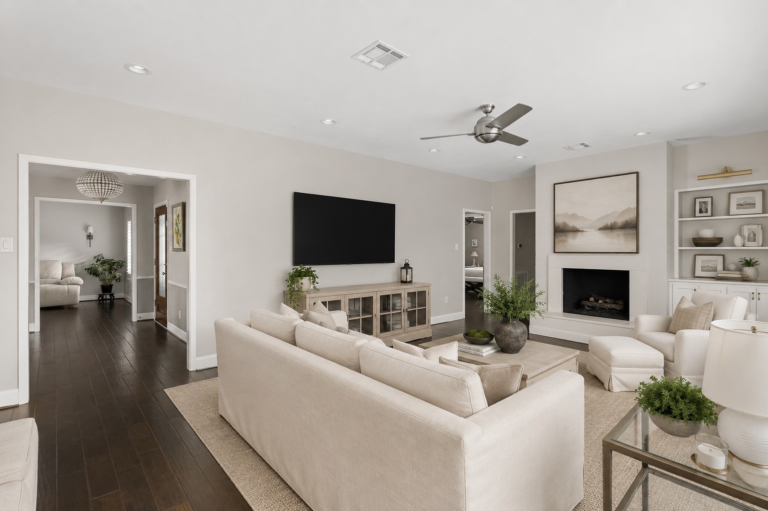 5743 Jason Street Houston, TX 77096 - Photo 12 of 26 a living room with fireplace furniture and a flat screen tv