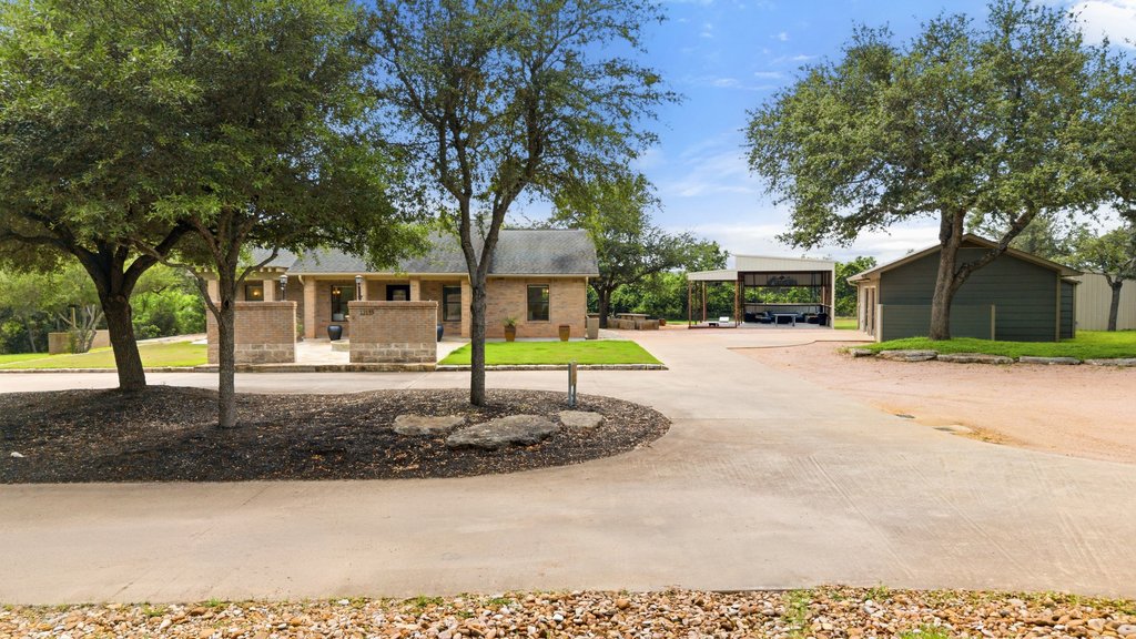 a house with trees in front of it