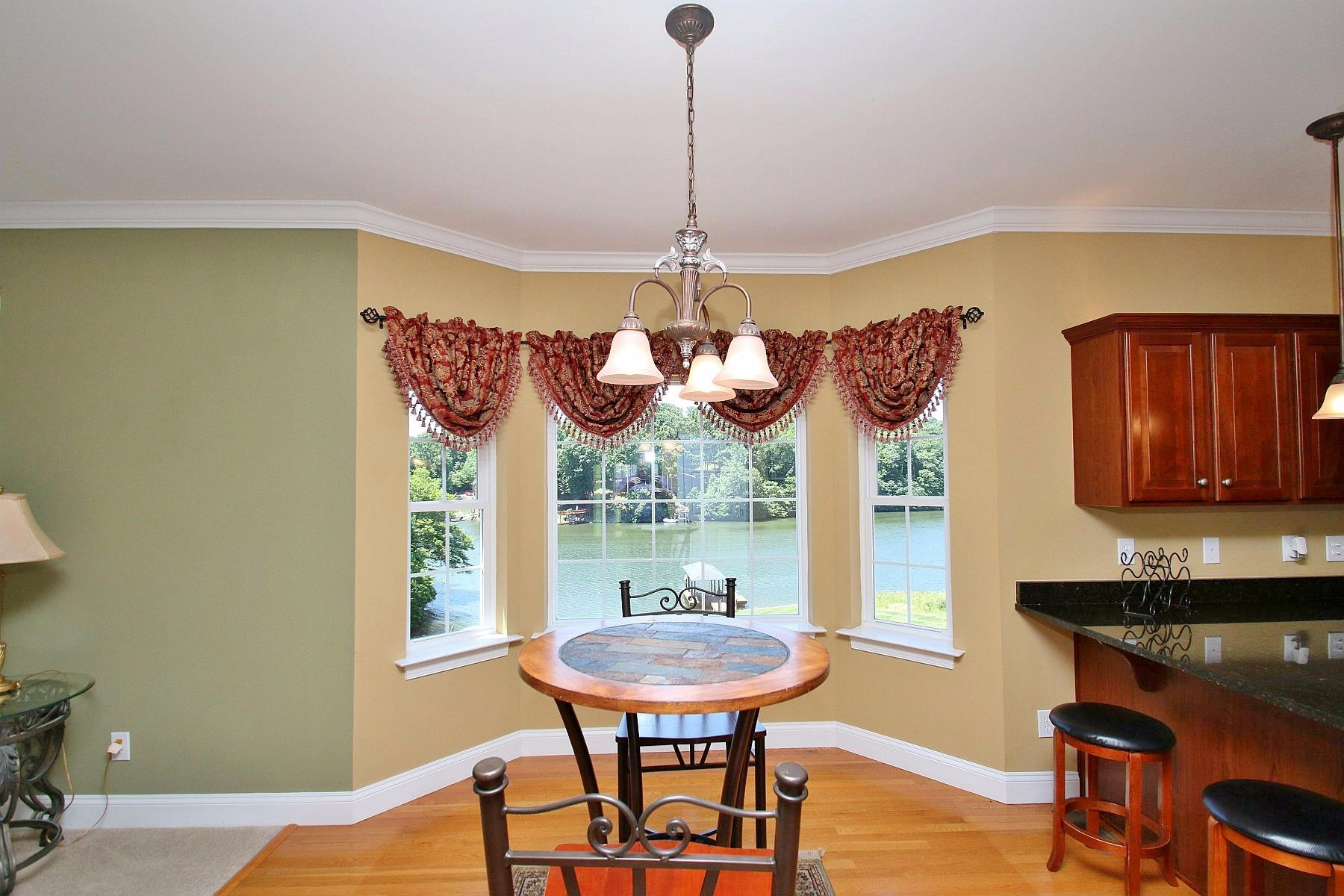 10 Old Point Road Moneta, VA 24121 - Photo 16 of 79 a view of a dining room with furniture window and outside view