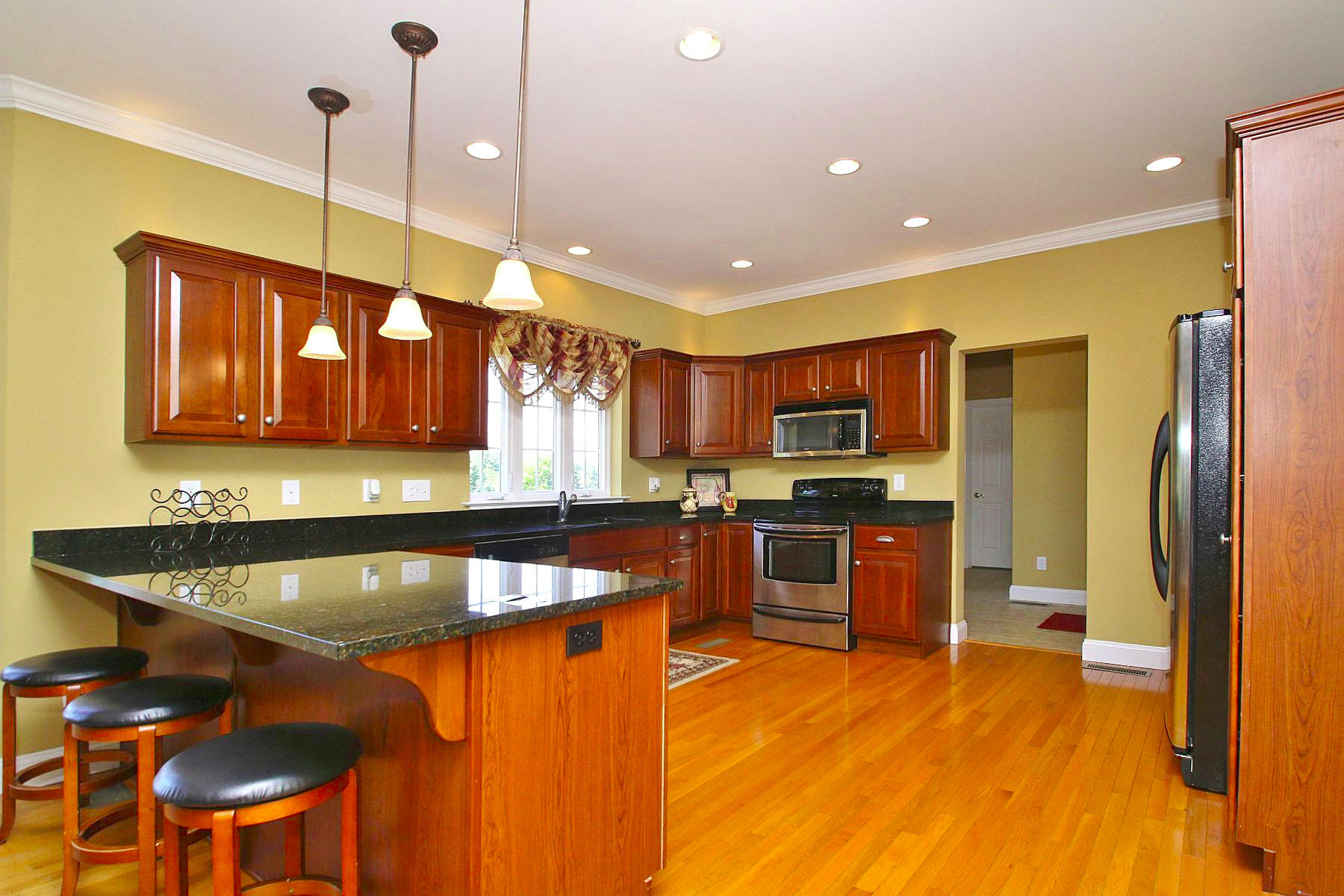 10 Old Point Road Moneta, VA 24121 - Photo 17 of 79 a kitchen with stainless steel appliances granite countertop a sink a stove top oven a counter space and cabinets