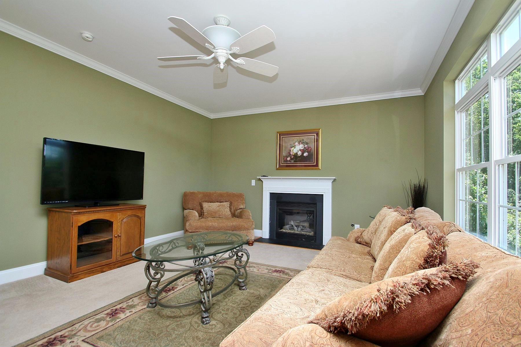 10 Old Point Road Moneta, VA 24121 - Photo 24 of 79 a living room with furniture a flat screen tv and a fireplace